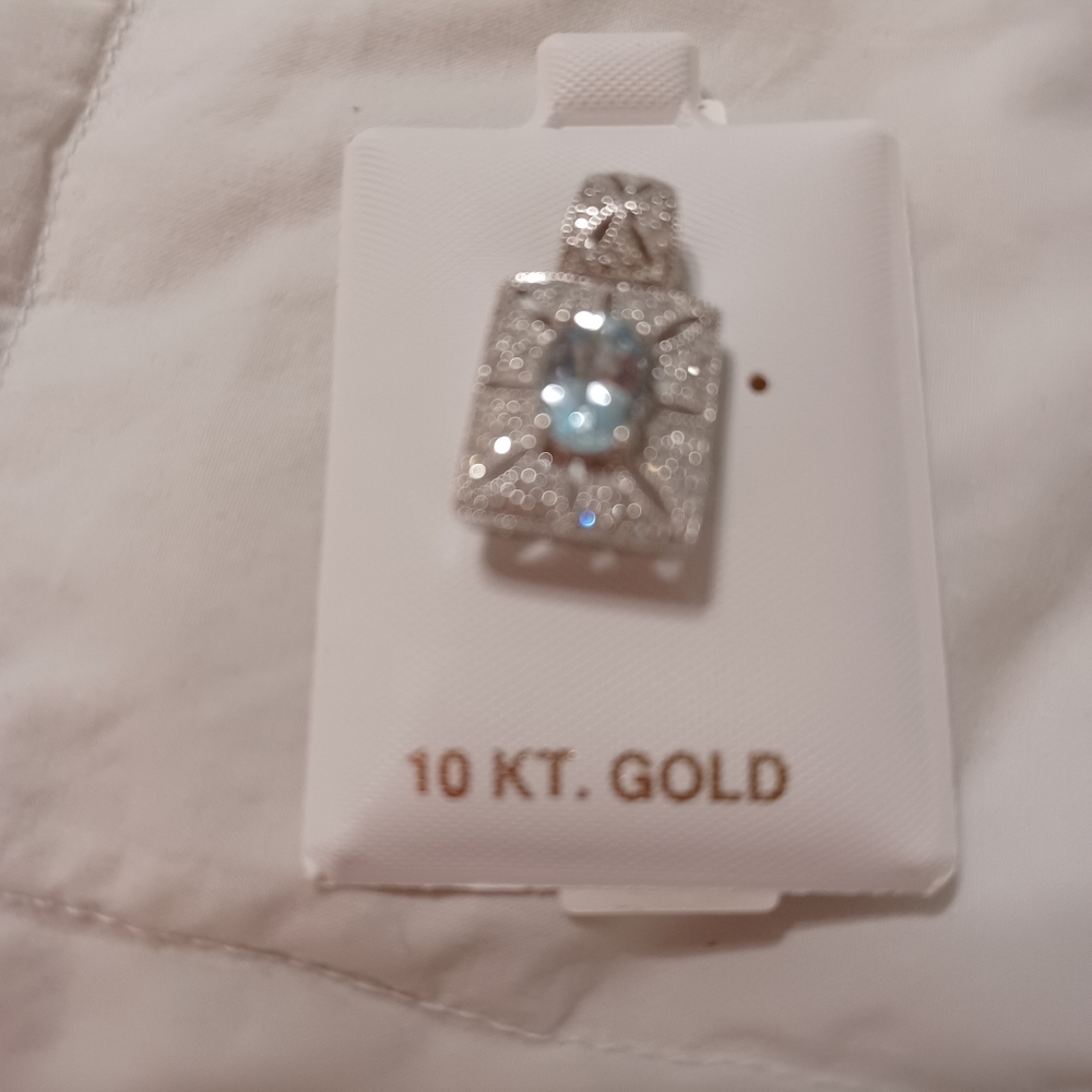 COPY - 10 kt WG, 1.00 CT aquamarine, with 3/4 total weight diamond Pendant.